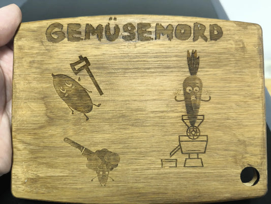 Graviertes Schneidebrett Gemüsemord